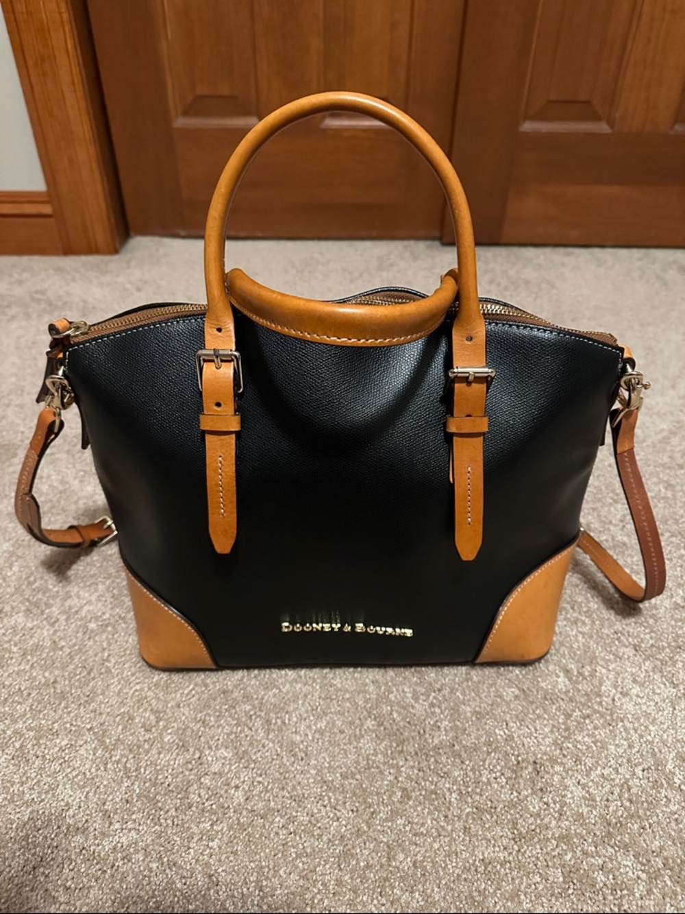 Dooney & Bourke Black and Tan Leather Satchel with Gold Hardware
